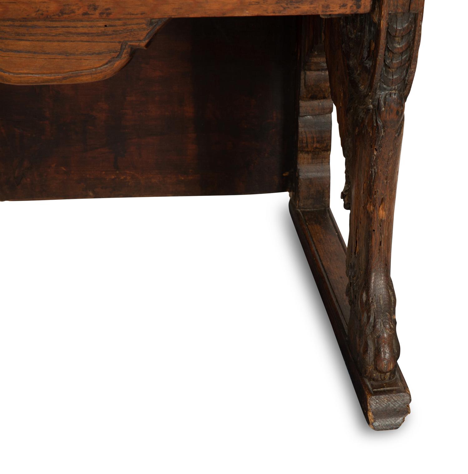 A Near Pair of Late Gothic Walnut and Oak Choir Stalls