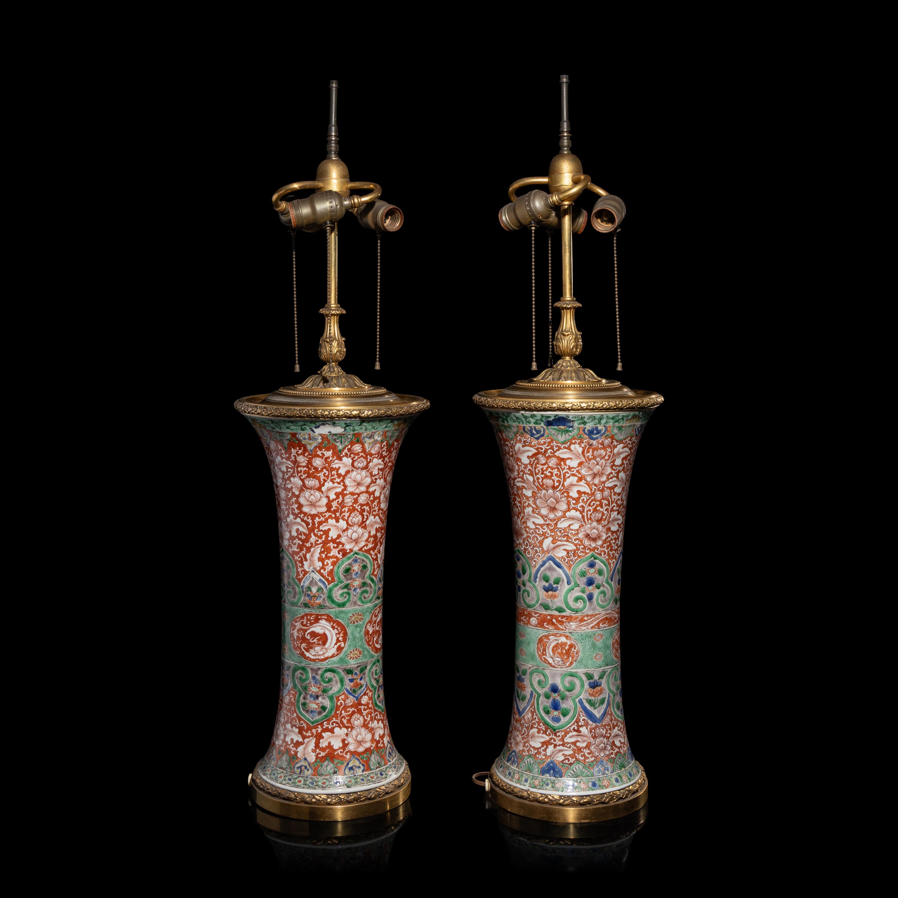 An Associated Pair of Chinese Famille Verte 'Flowers' Porcelain Gu Vases, 18th/19th Century — 清中期 五彩纏枝花卉紋觚一對