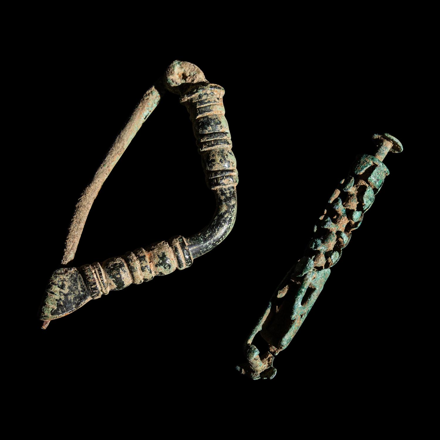 A Group of 5 Greco-Roman Fibulae and 2 Geometric Bronze Objects