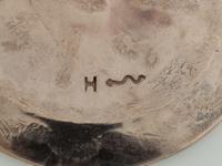 Group of Heavily Stamped Silver Coasters