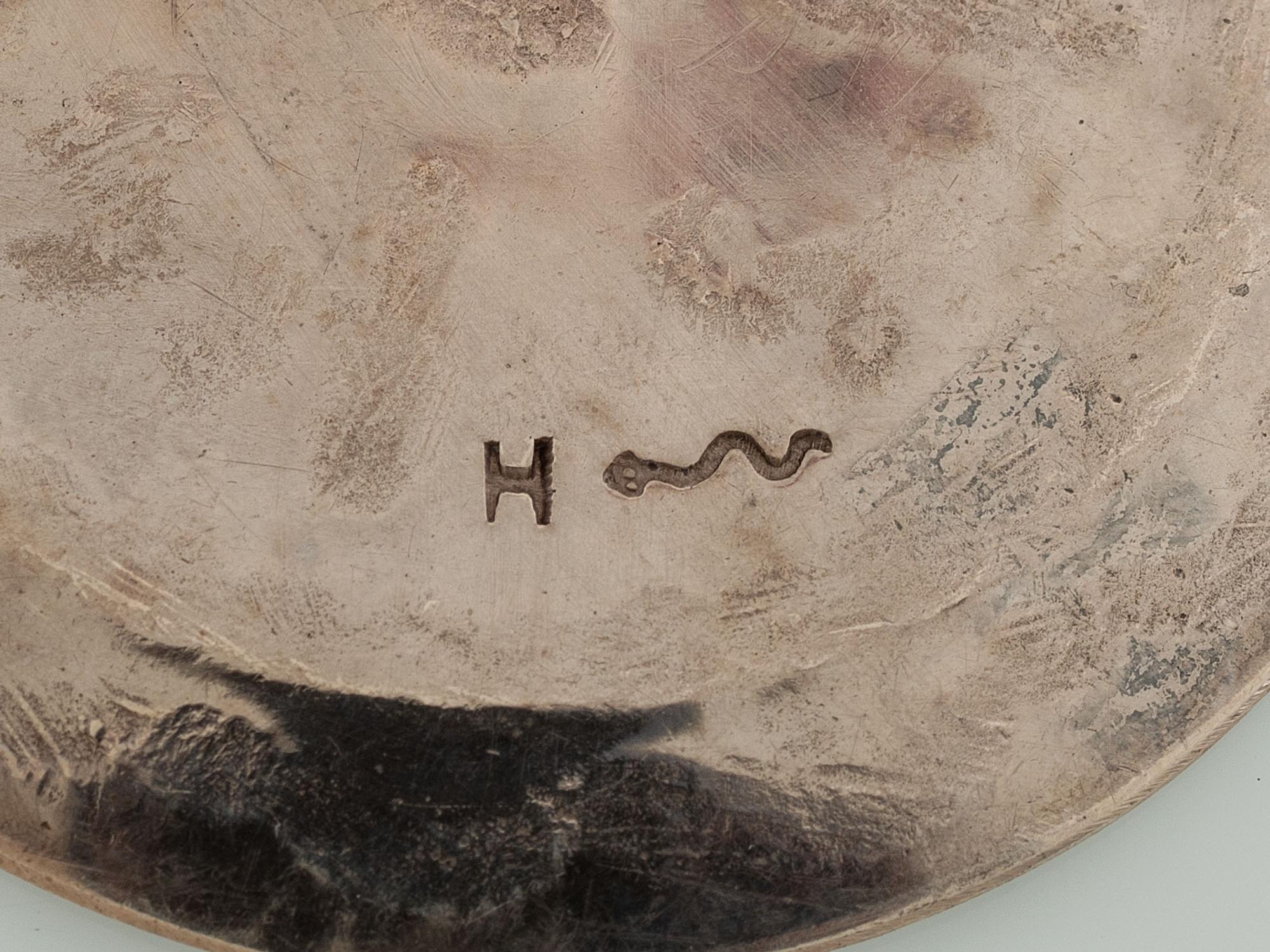 Group of Heavily Stamped Silver Coasters