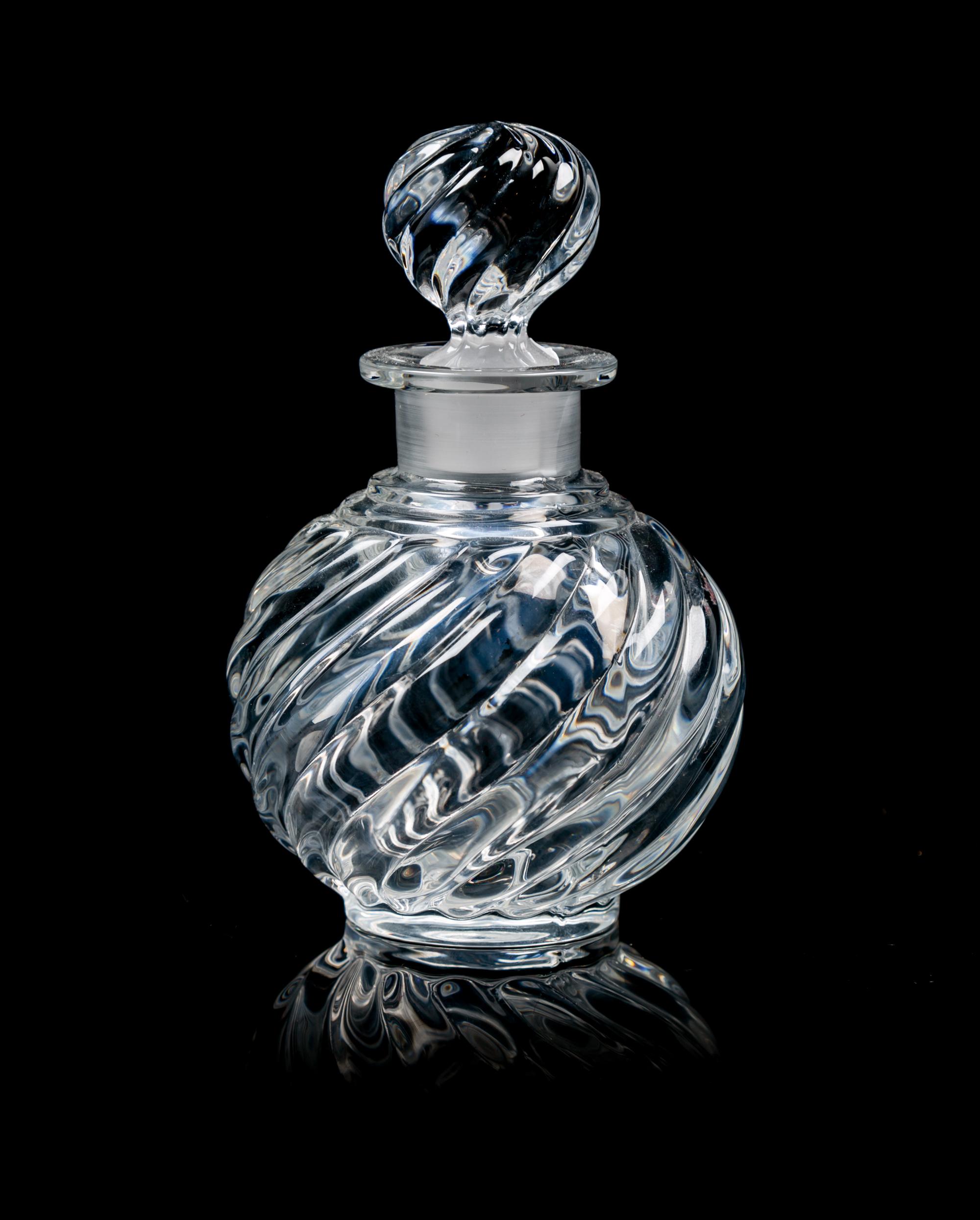 A Baccarat Glass Perfume Bottle Height 4 1/4 inches.