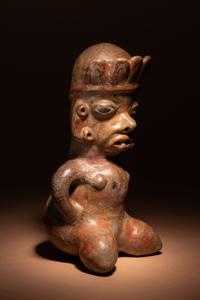 A Nicoya Polychrome Terracotta Seated Figure