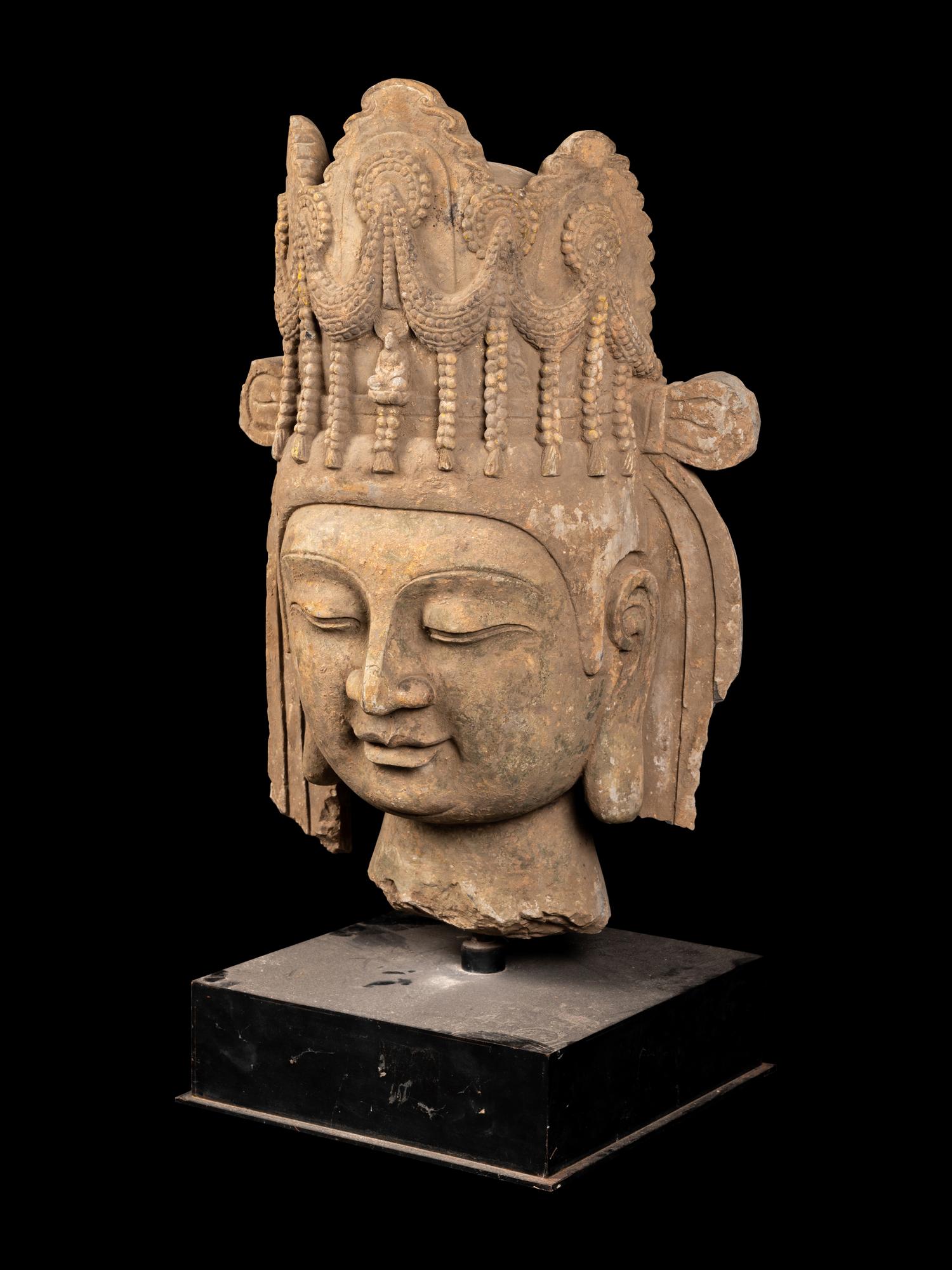 A Chinese Monumental Carved Stone Head