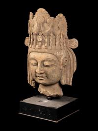 A Chinese Monumental Carved Stone Head
