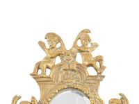 A Pair Of French Brass And Mirror-Inset Two-Light Sconces
