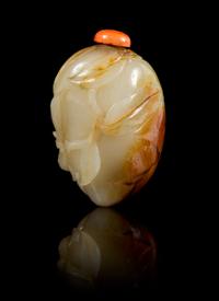 A Carved Jade Snuff Bottle Height 2 3/8 inches.