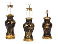 A Group of Three Ebonized and Parcel Gilt Table Lamps Height 22 inches. — 20TH CENTURY