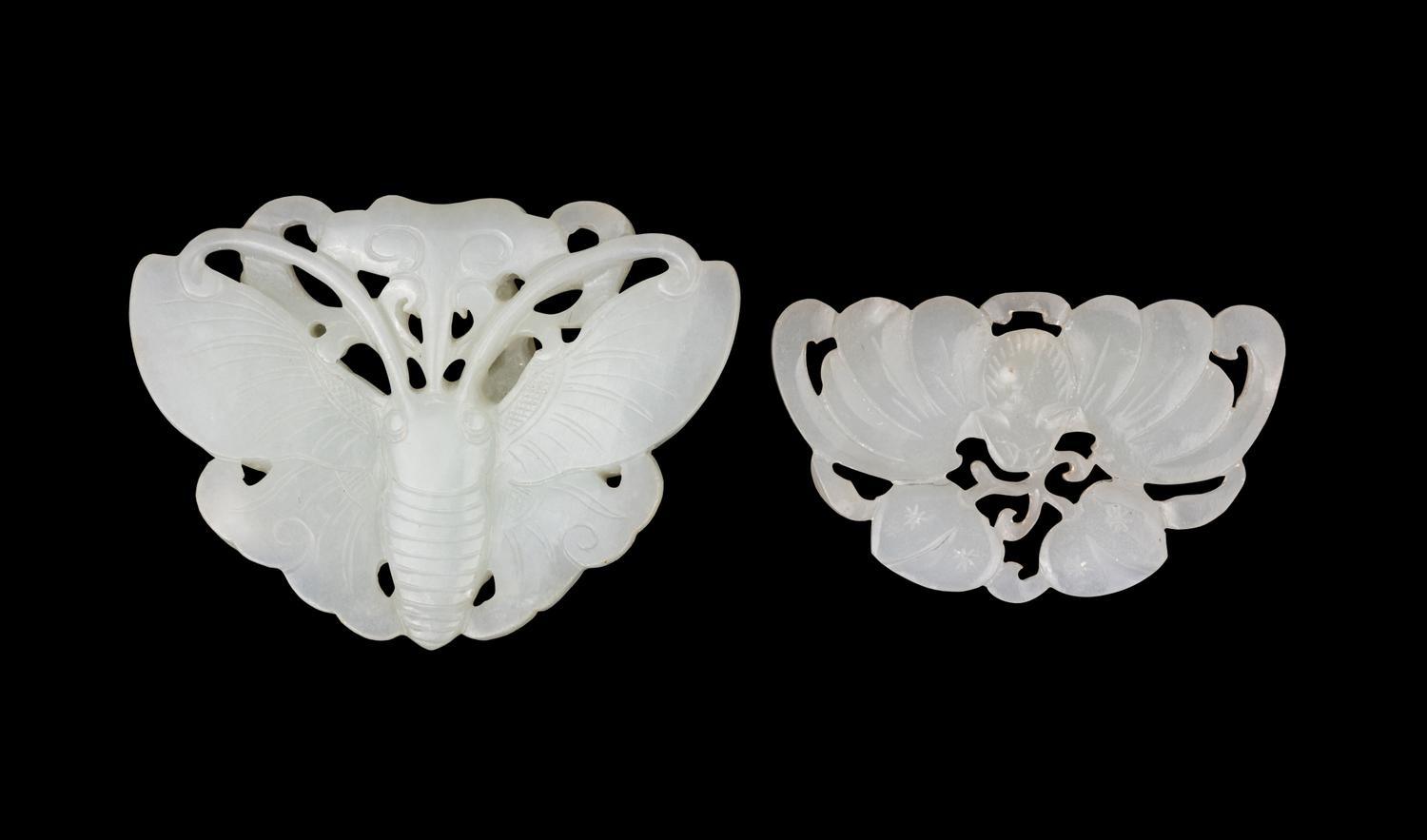 Two Chinese Carved Pale Celadon Jade Pendants
