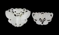 Two Chinese Carved Pale Celadon Jade Pendants