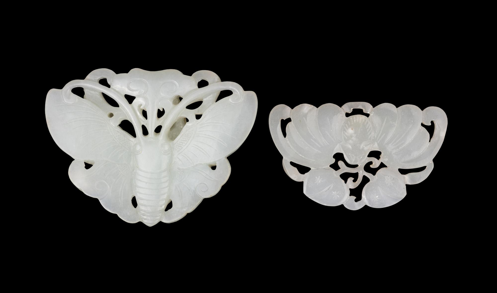 Two Chinese Carved Pale Celadon Jade Pendants