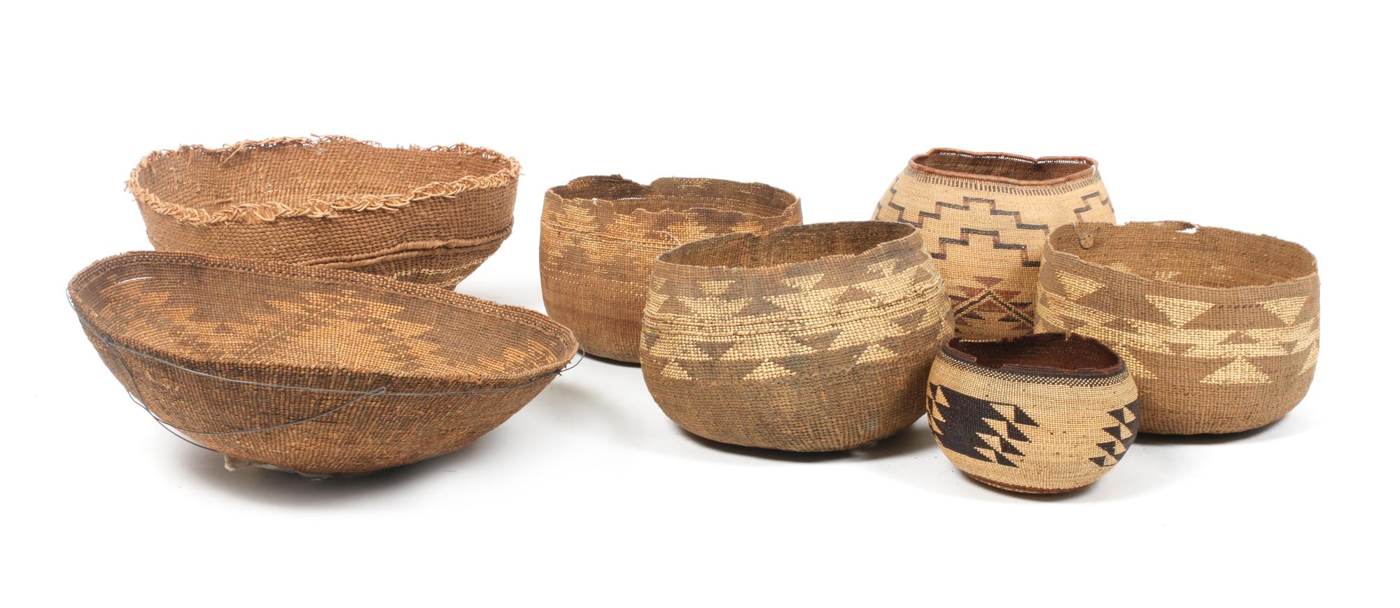 Seven California Hupa/ Yurok Area Baskets Height of largest 7 x diameter 18 inches.