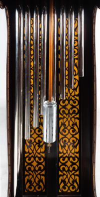 A Victorian Carved Mahogany and Marquetry Nine-Tube Tall Case Clock