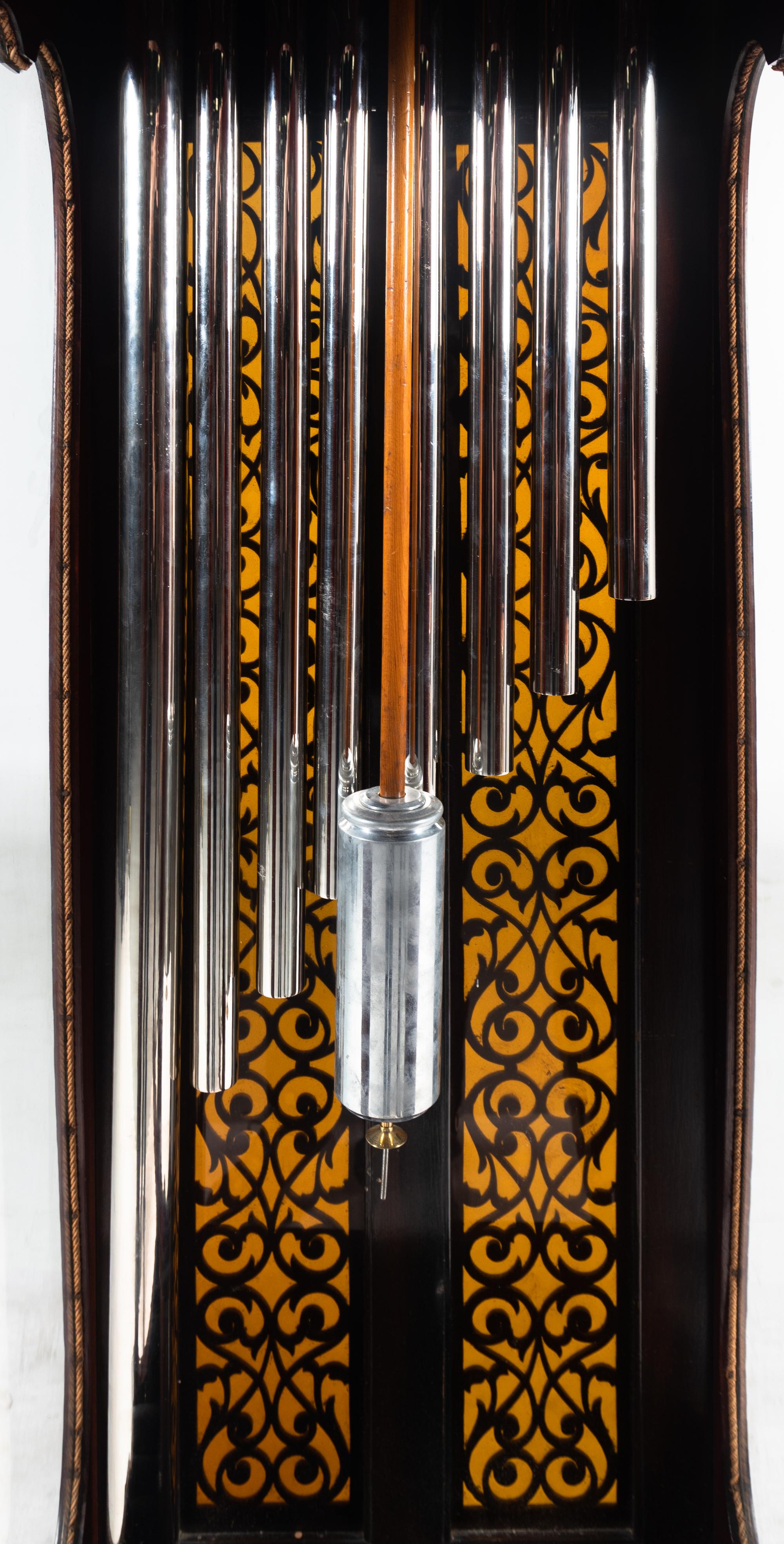 A Victorian Carved Mahogany and Marquetry Nine-Tube Tall Case Clock