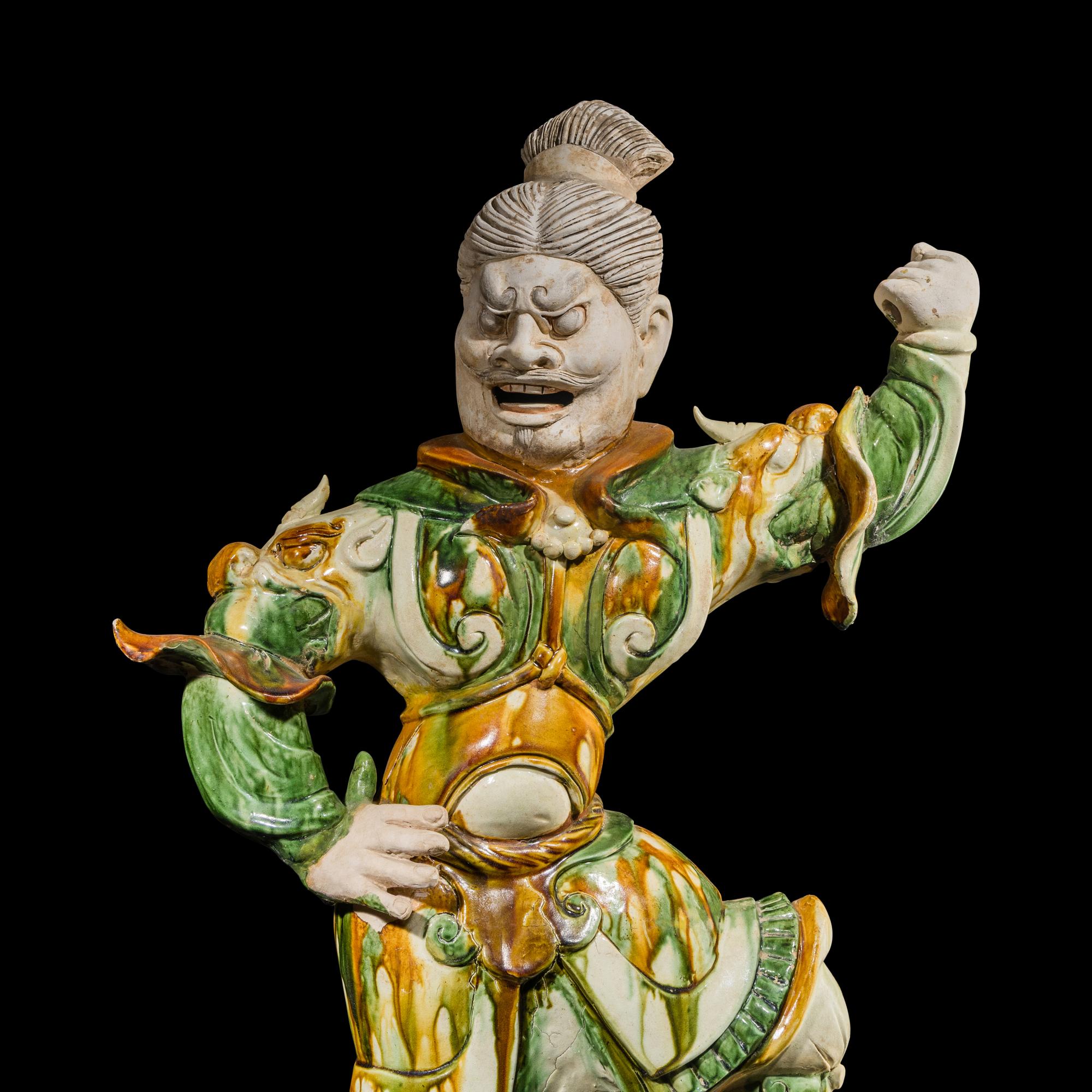 A Chinese Sancai Glazed Pottery Figure of a Lokapala, Tang Dynasty — 唐 三彩天王俑