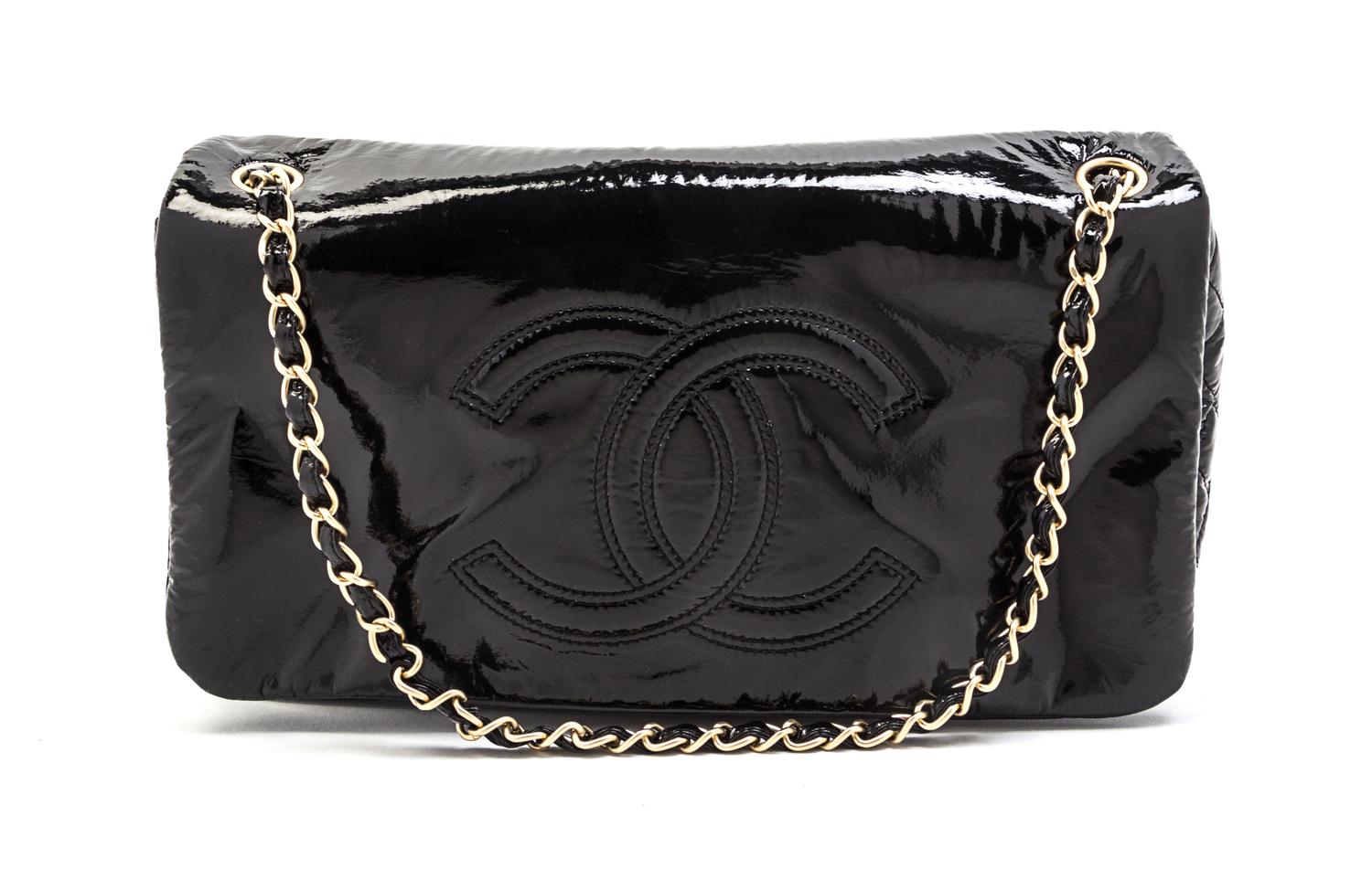 A Chanel Black Patent Vinyl Bag, 11 x 6 1/2 x 3 inches.