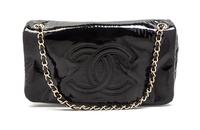 A Chanel Black Patent Vinyl Bag, 11 x 6 1/2 x 3 inches.