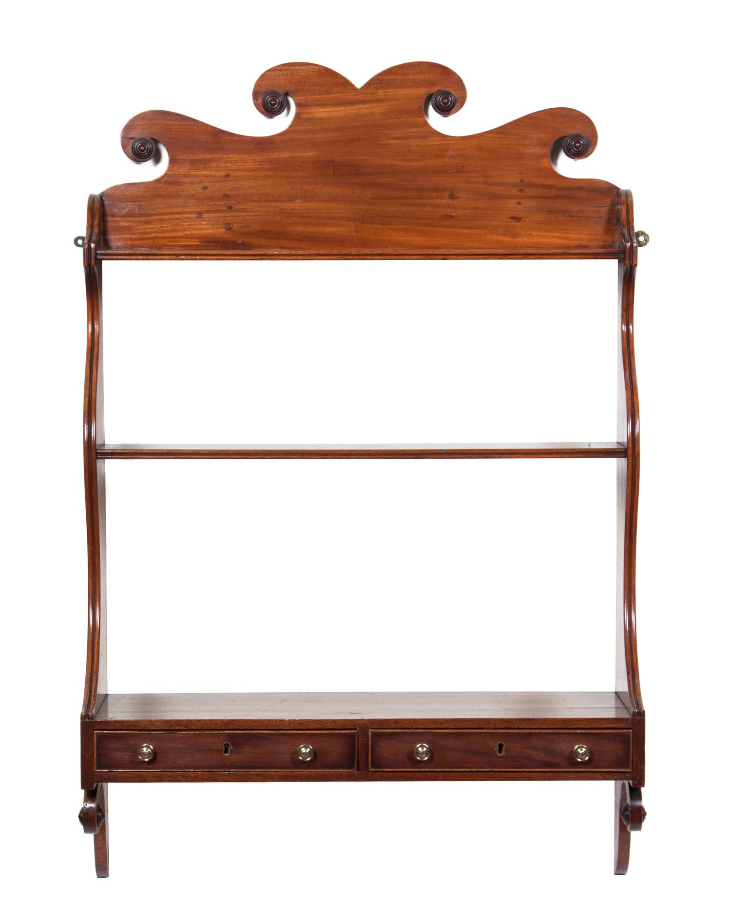 An English Mahogany Hanging Wall Shelf Height 41 inches.