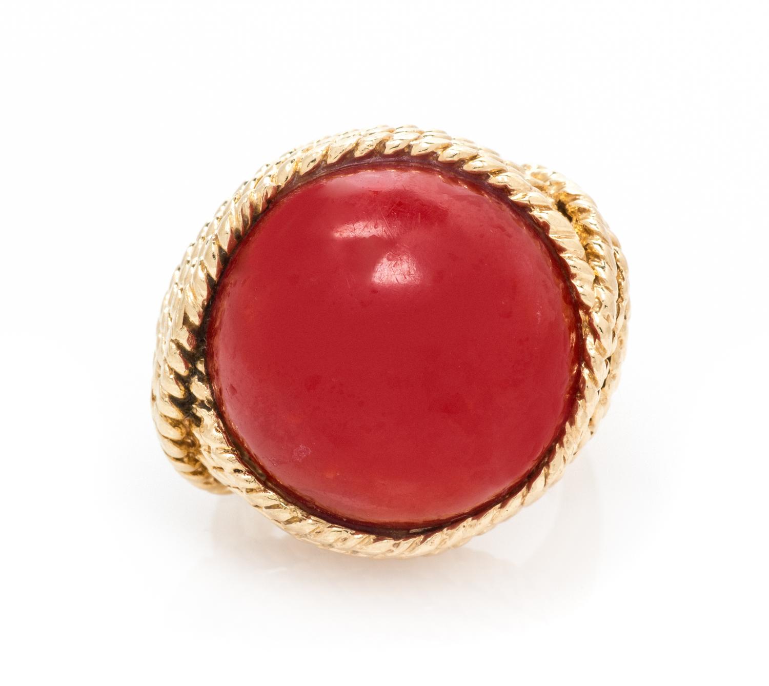 A 14 Karat Yellow Gold and Coral Ring, 11.90 dwts.