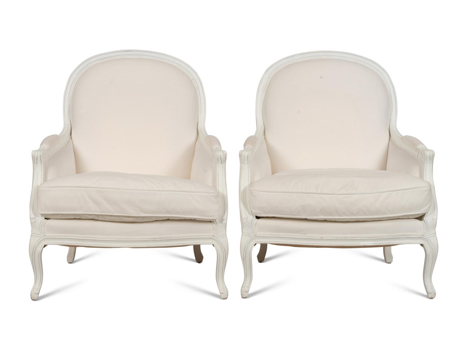 A Pair of Louis XV Style White-Painted Bergères