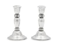 A Pair of Harald Nielsen Designed Georg Jensen Silver Candlesticks