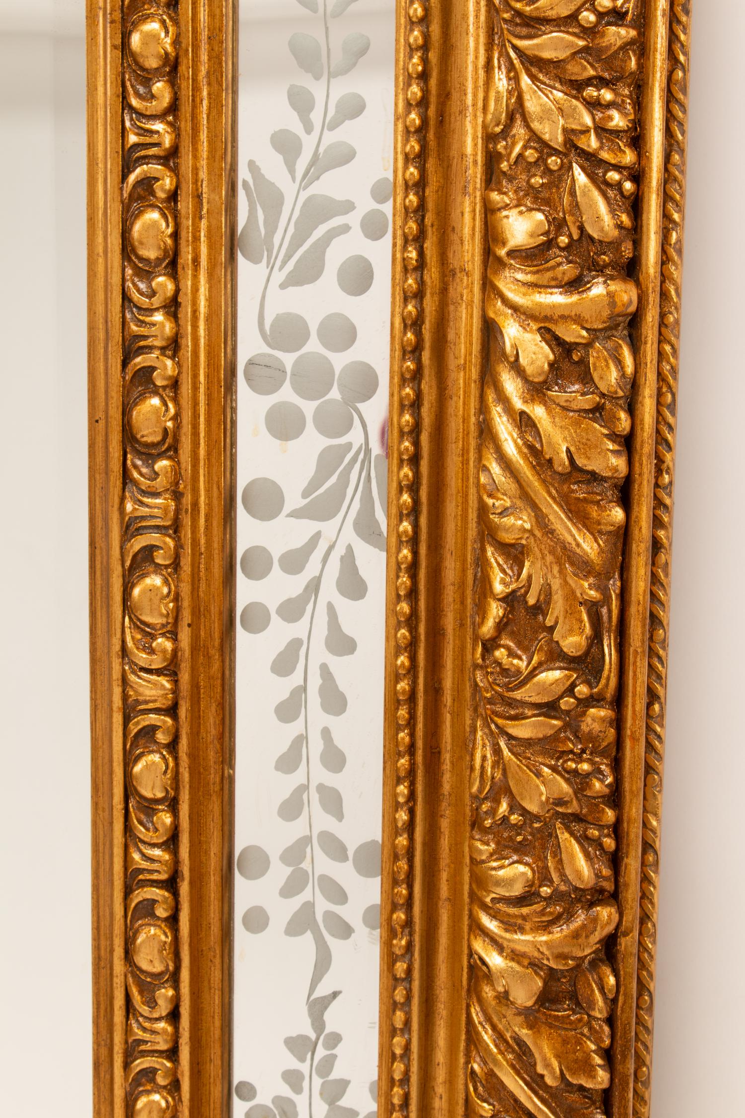 A Pair of Louis XV Style Gilt and Engraved Mirrors