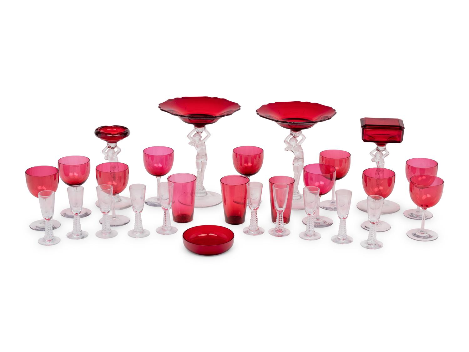 A Group of Clear and Ruby Glass Table Articles