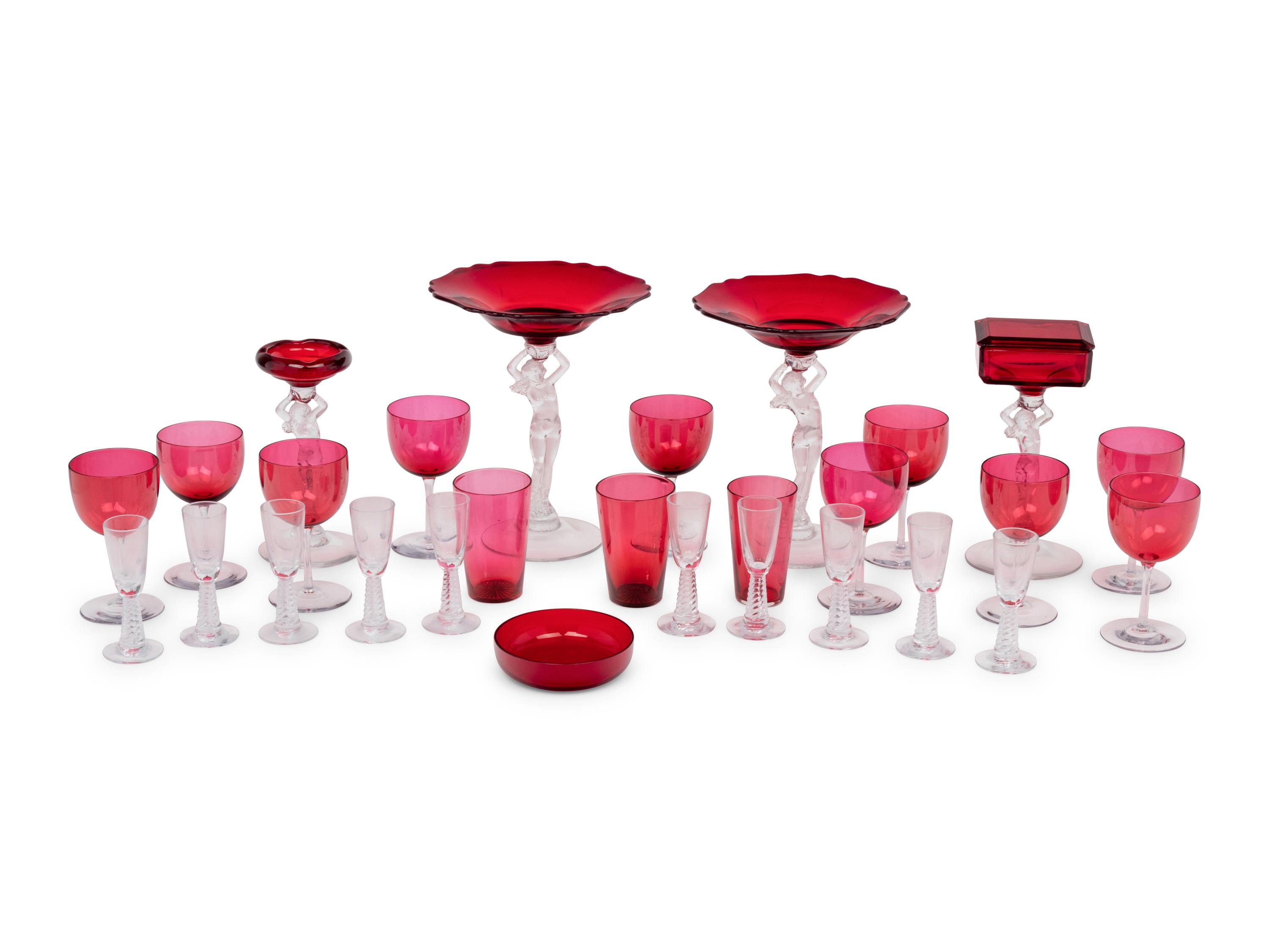 A Group of Clear and Ruby Glass Table Articles