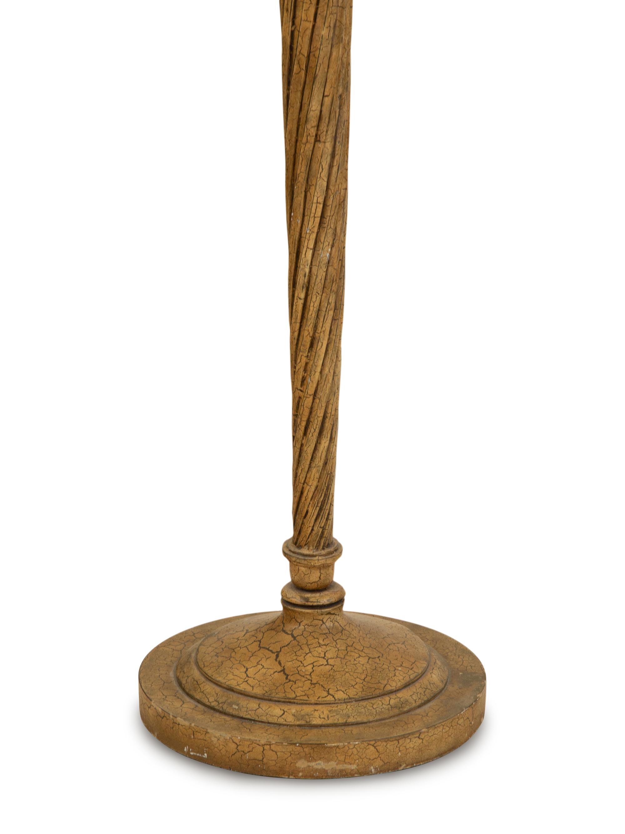 A Pair of Painted Metal and Carved Wood Torchere Style Floor Lamps