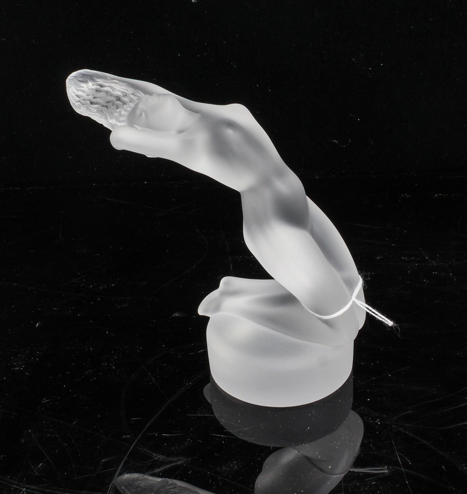 A Lalique Molded and Frosted Glass Figure Height 5 1/2 inches.