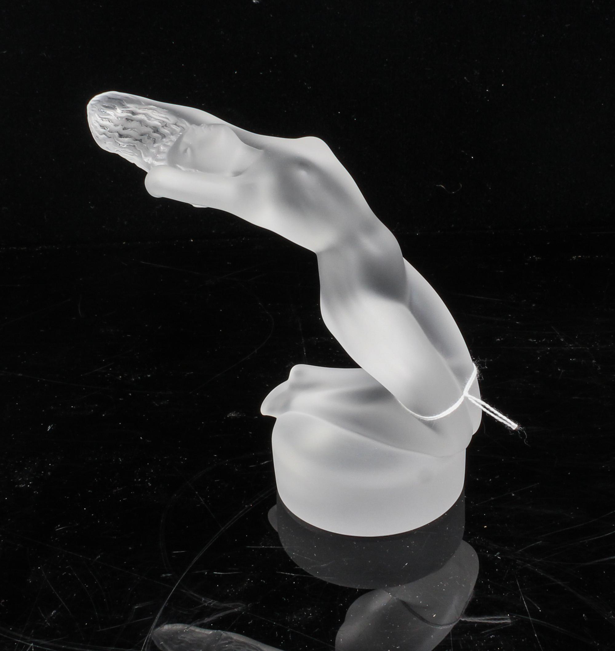 A Lalique Molded and Frosted Glass Figure Height 5 1/2 inches.