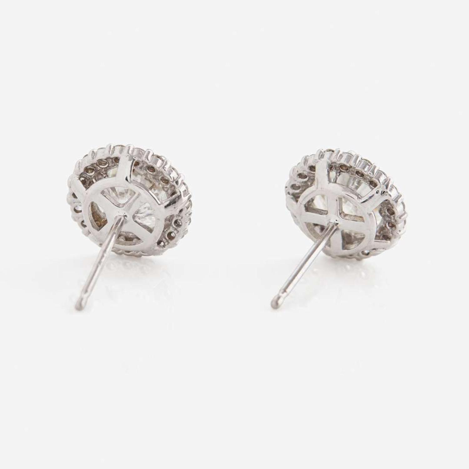 A Pair of 18K White Gold and Diamond Earrings