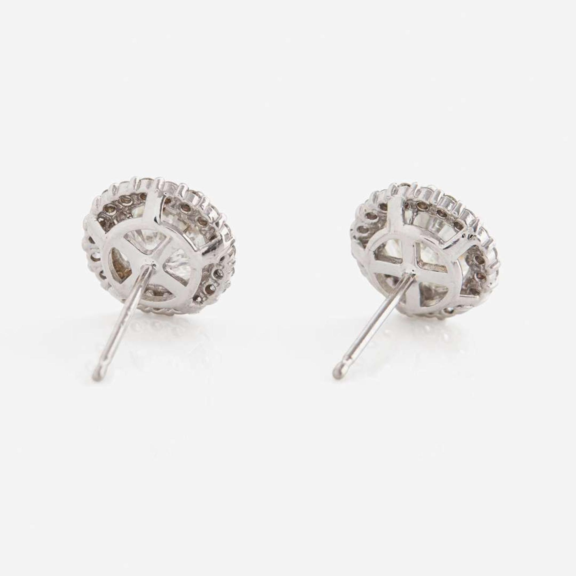 A Pair of 18K White Gold and Diamond Earrings