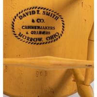 A Yellow Painted Bow Back Compass-Seat Windsor Tall Chair