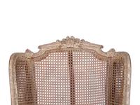 A Louis XVI Style Caned Bergere — LATE 19TH/EARLY 20TH CENTURY