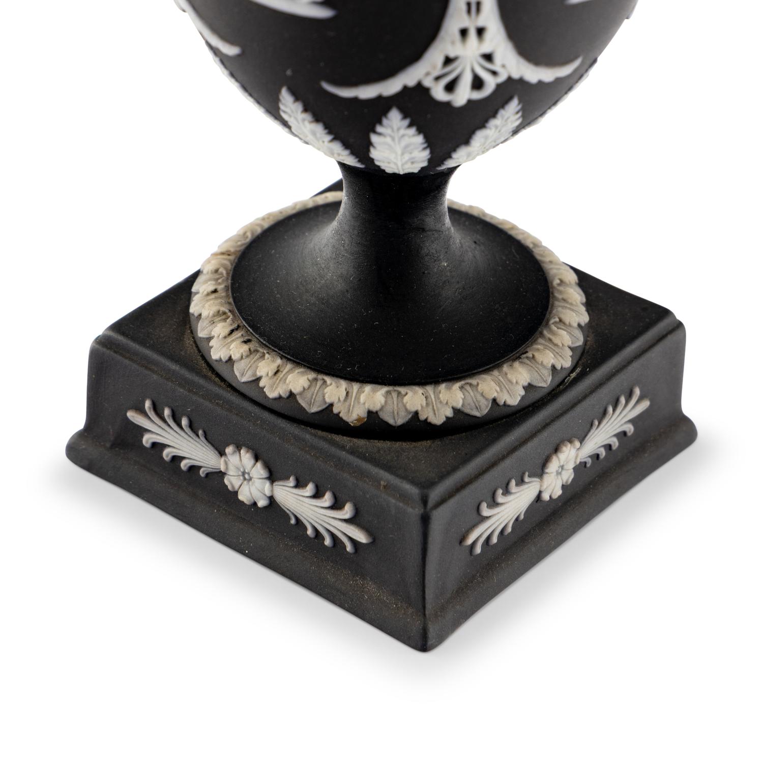 A Pair of Wedgwood Black Jasperware Urns