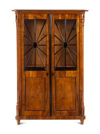 A Biedermeier Part-Ebonized Figured Walnut Bookcase