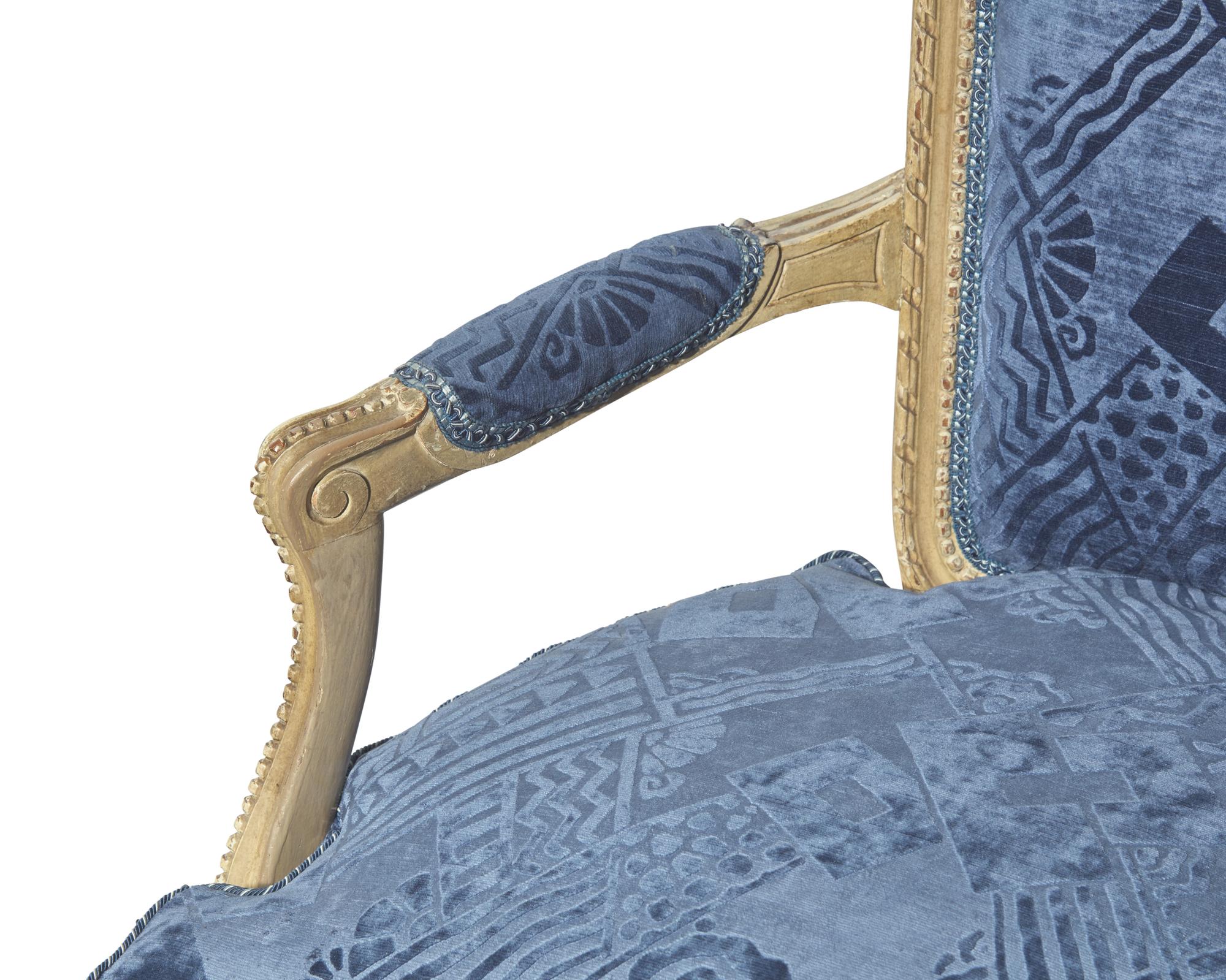 A pair of Louis XVI style white-painted bergères, probably 19th century