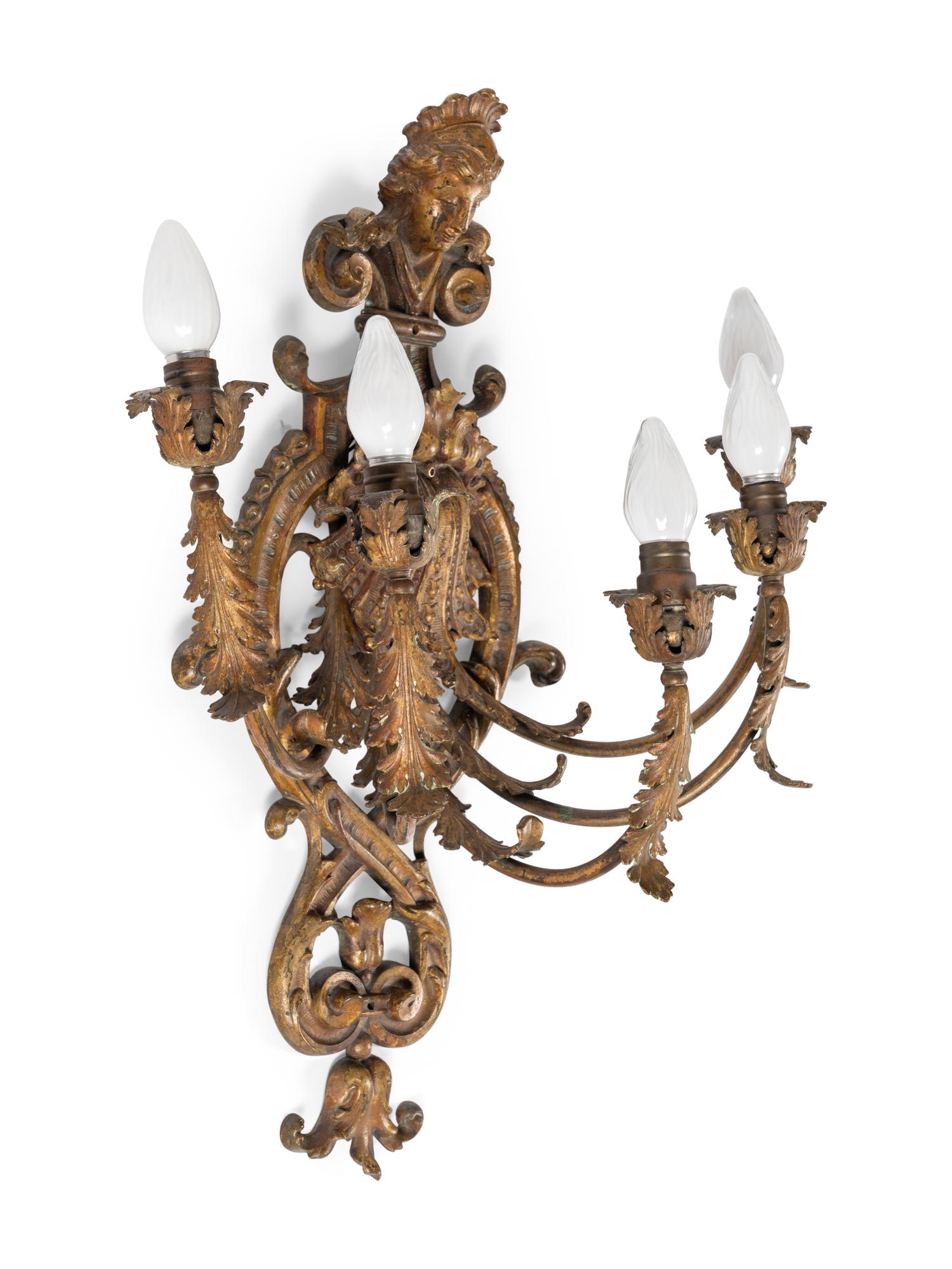 A Pair of Régence Style Gilt Metal Five-Light Sconces