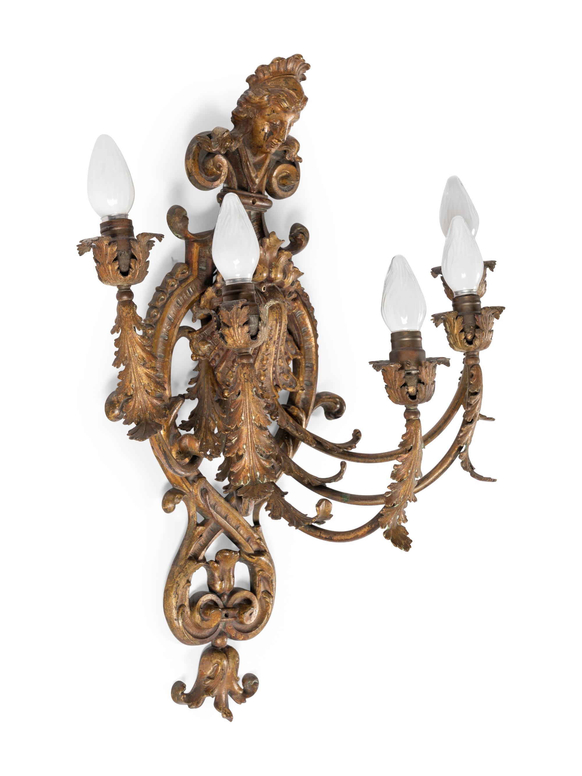 A Pair of Régence Style Gilt Metal Five-Light Sconces