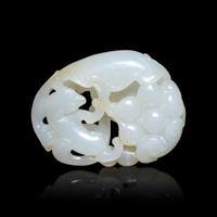 A Chinese White Jade 'Squirrel and Grape' Pendant, 20th Century 近代 白玉鏤雕松鼠葡萄紋珮