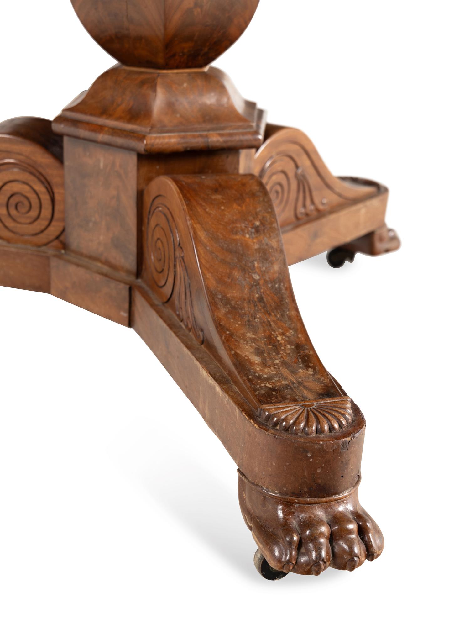 A Louis Philippe Mahogany Marble-Top Center Table