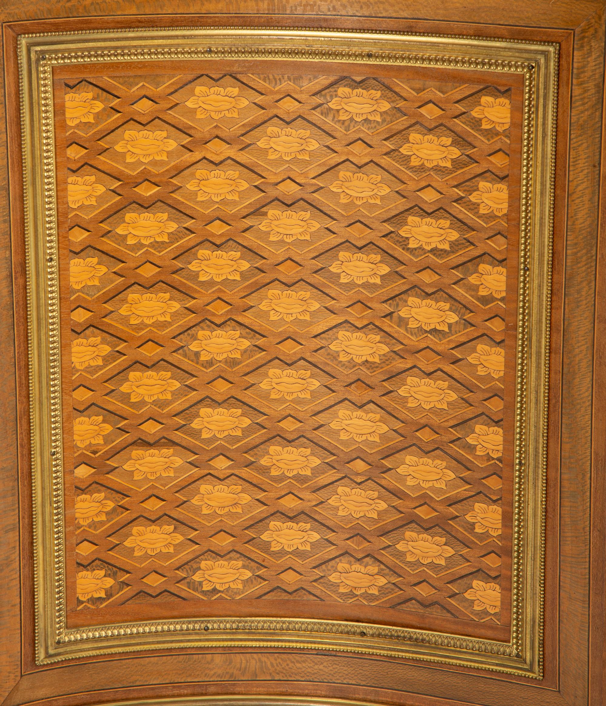 A Louis XVI Style Gilt Bronze Mounted Kingwood and Marquetry Marble-Top Commode