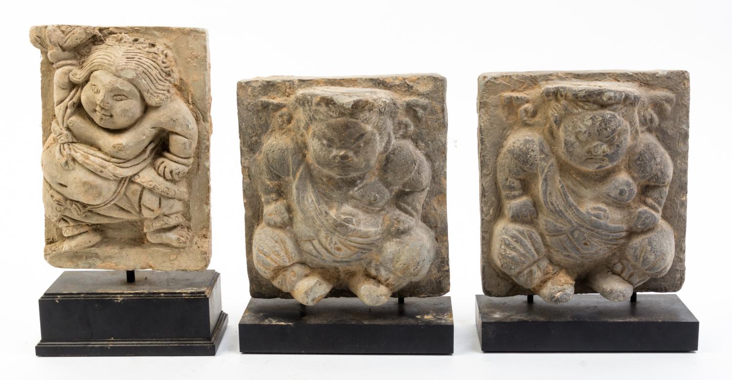 A Group of Three Southeast Asian Figural Carvings Height of first 7 x width 5 1/4 inches.