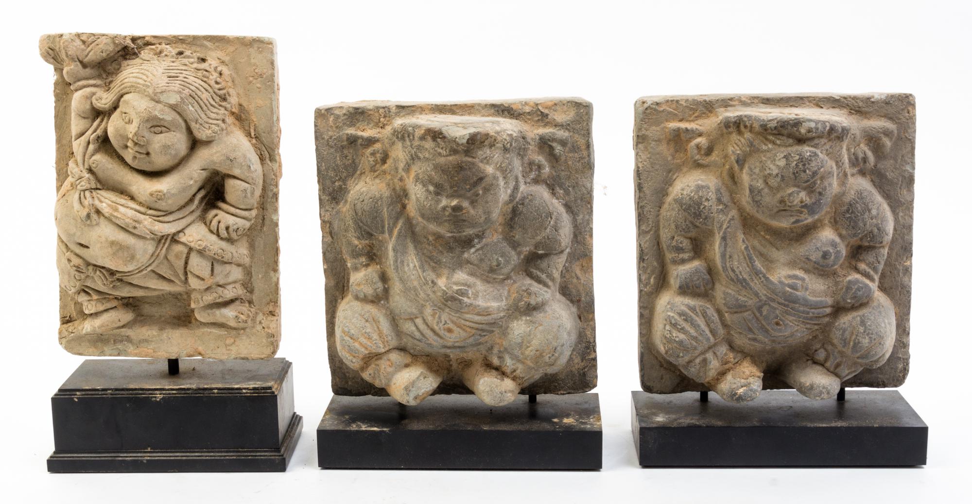 A Group of Three Southeast Asian Figural Carvings Height of first 7 x width 5 1/4 inches.