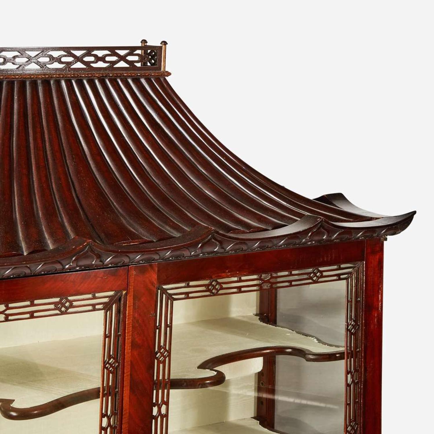 A pair of Chinese Chippendale style carved mahogany and glass display cabinets 20th century
