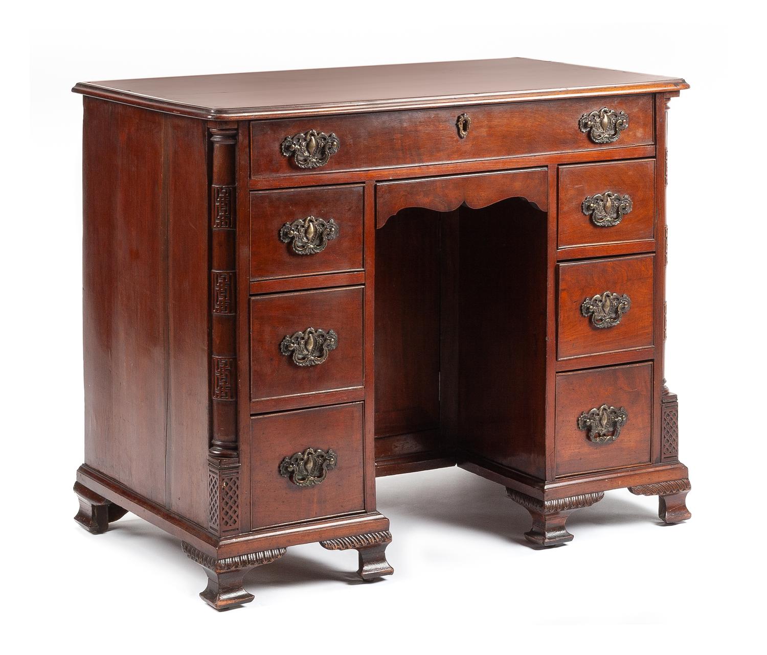 A Georgian Style Kneehole Desk Height 30 x width 36 1/2 x depth 21 inches. — 19TH CENTURY
