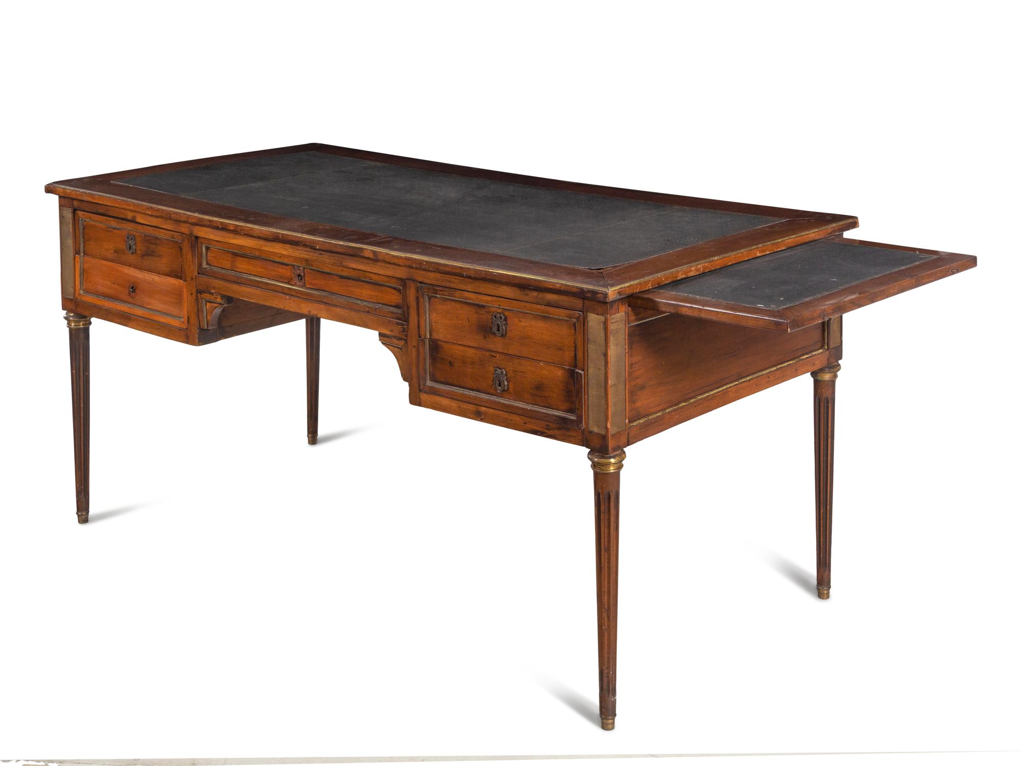A Louis XVI Style Brass Mounted Walnut Bureau Plat