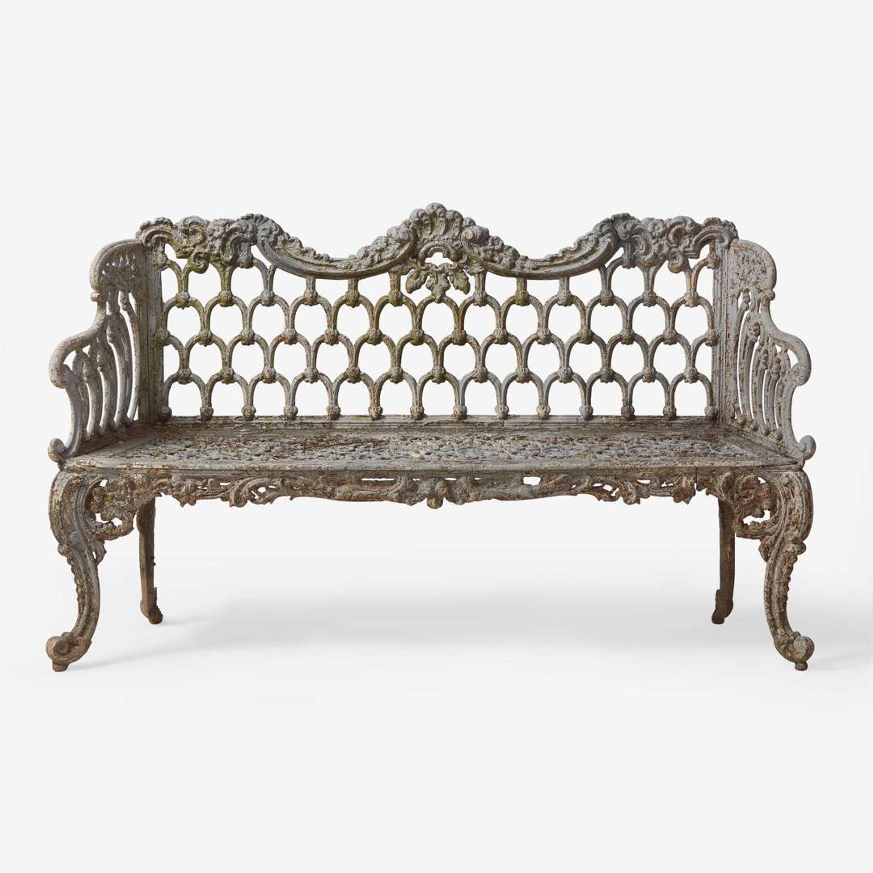 A white-painted cast iron garden bench late 19th century