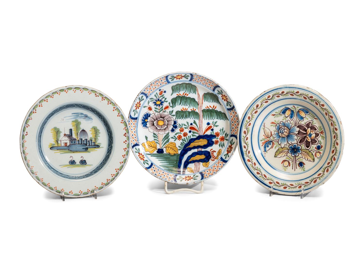 Three Polychrome Delftware Plates
